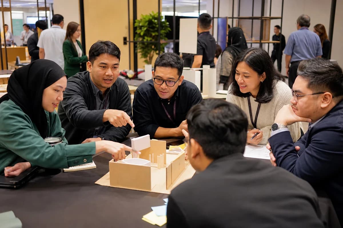Event attendees collaborating during an innovation workshop
